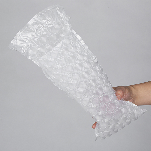 L'imballaggio protettivo di vendita calda vende all'ingrosso l'involucro del cuscino a bolle d'aria